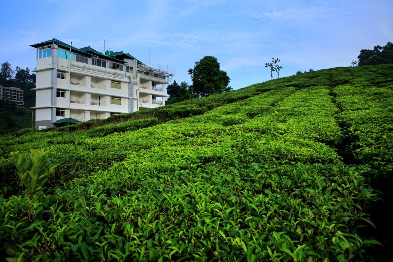 Monsoon Grande Hotel Мунар Екстериор снимка