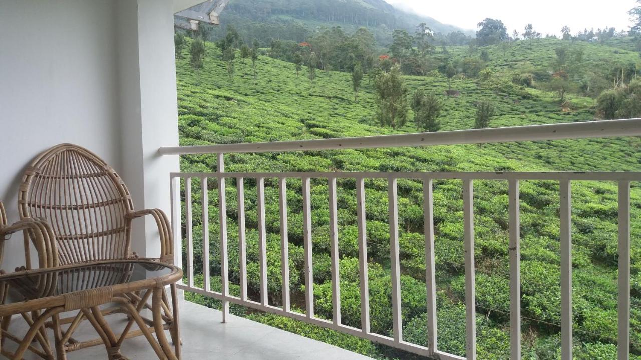 Monsoon Grande Hotel Мунар Екстериор снимка