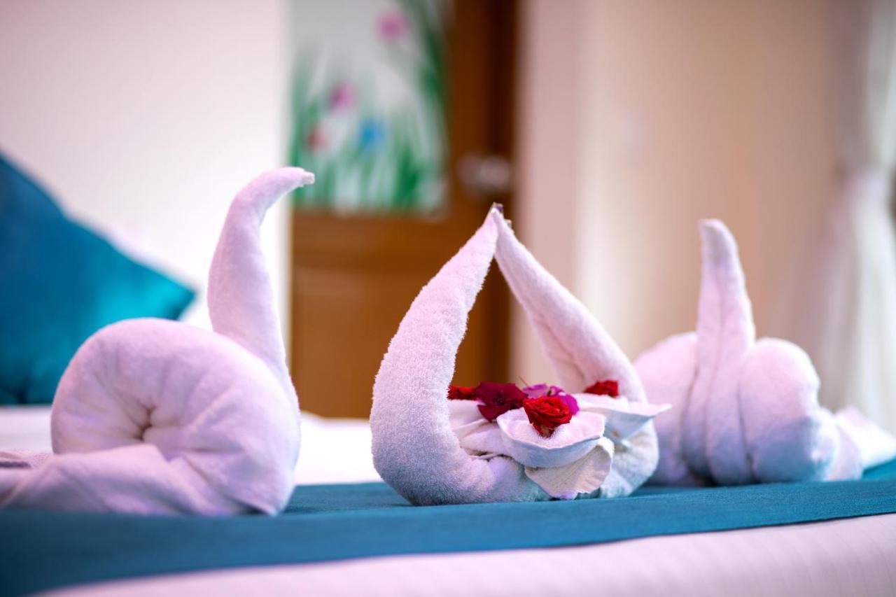 Monsoon Grande Hotel Мунар Екстериор снимка