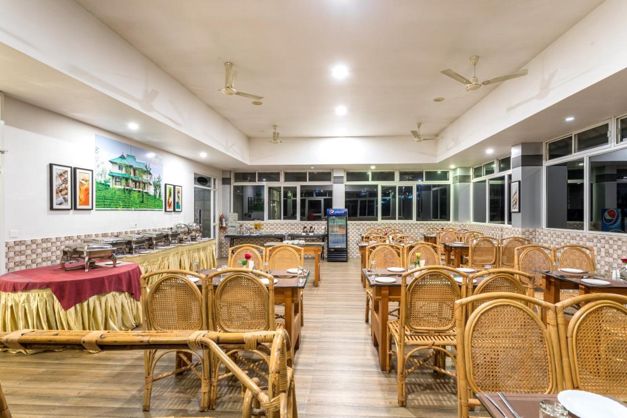 Monsoon Grande Hotel Мунар Екстериор снимка