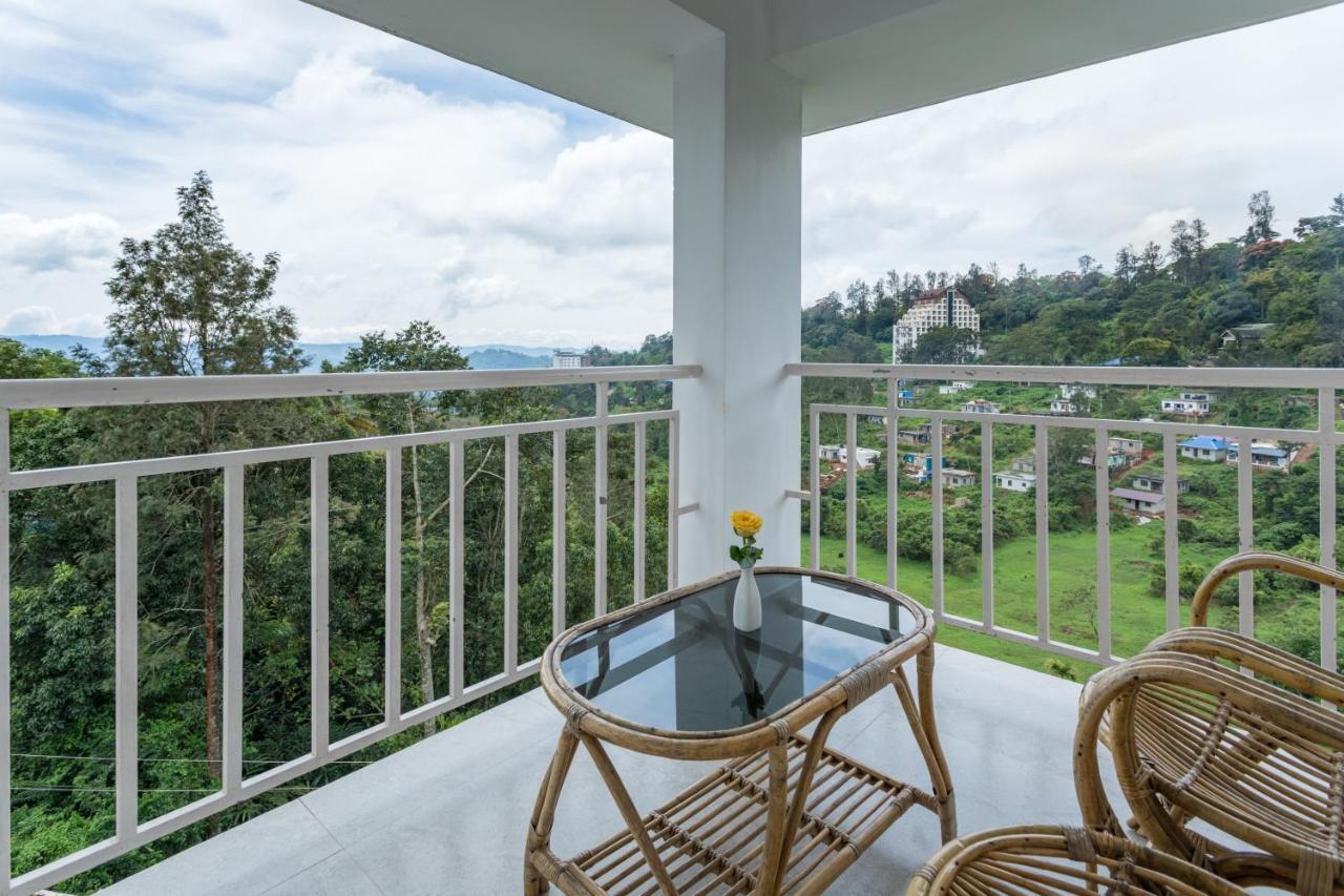 Monsoon Grande Hotel Мунар Екстериор снимка